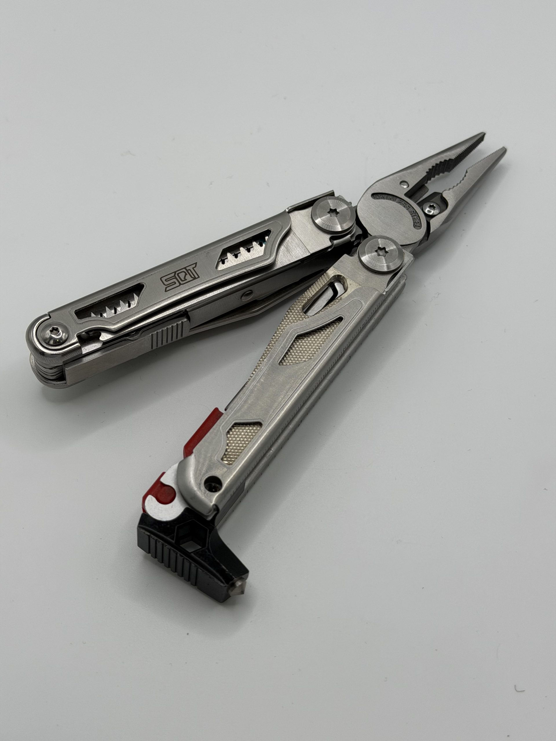 SQT Multi-tool Pliers with Fire Starter, Emergency Whistle, Glass Breaker, Safety Locking and Nylon Sheath for Survival, Camping KT2038A (4) SQT Multi-tool Pliers with Fire Starter, Emergency Whistle, Glass Breaker, Safety Locking and Nylon Sheath for Survival, Camping KT2038A - Image 1